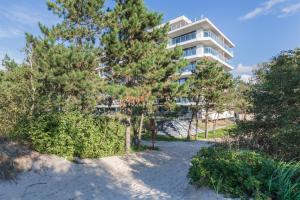 Zahrada ubytování Prestiżowe Apartamenty Natural Darłówko by Noclegi Renters + 109 fotografií