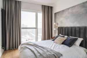 Ένα ή περισσότερα κρεβάτια σε δωμάτιο στο Choya Apartments