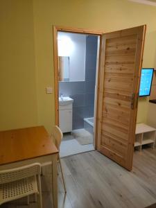 Ein Badezimmer in der Unterkunft Apartamenty Daola
