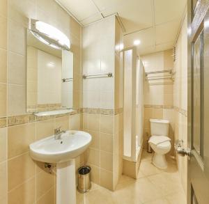 a bathroom with a sink and a toilet at Kas Bilgin Hotel in Kas +46 photos