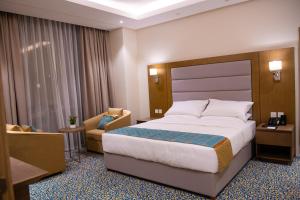 Letto o letti in una camera di ROZANA HOTEL