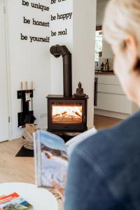 Et tv og/eller underholdning på Mountain Mama Ferienhaus