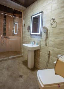 Koupelna v ubytování Apart Hotel West