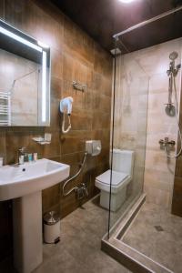 Koupelna v ubytování Apart Hotel West