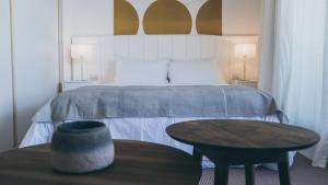 Casagrande Hotel & Beach Club客房内的一张或多张床位