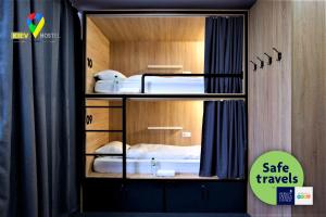 a cabinet with two bunk beds in it at Kyiv Hotel in Kyiv