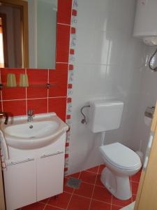Koupelna v ubytování Apartments Sanja