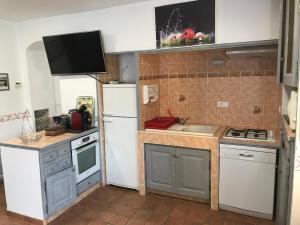 Kjøkken eller kjøkkenkrok på Les 13 Chimères