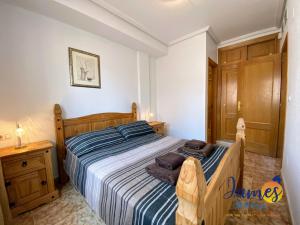 Postel nebo postele na pokoji v ubytování La Ciñuelica R11 Ground Floor Apartment Com Pool L111 + 6 fotografií