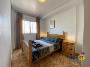Postel nebo postele na pokoji v ubytování La Ciñuelica R11 Ground Floor Apartment Com Pool L111