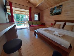 Postel nebo postele na pokoji v ubytování La Rose du Sud
