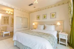 Ένα ή περισσότερα κρεβάτια σε δωμάτιο στο Studio no Il Campanario Jurerê Internacional - 2303 +20 φωτογραφίες