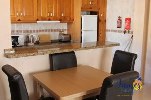 Een keuken of kitchenette bij Luxury Quad House Playa Golf R6 with Com Pool P241