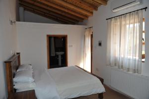 Postel nebo postele na pokoji v ubytování Maritsa Lodge