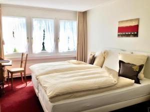 Voodi või voodid majutusasutuse Hotel & Spezialitätenrestaurant zur Linde toas