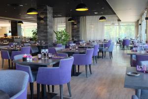 En restaurant eller et andet spisested på Hotel & Spa Marina d'Adelphia