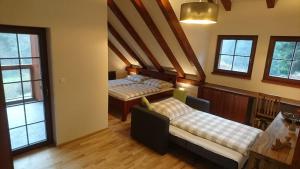 Postel nebo postele na pokoji v ubytování Jezírko lesní restaurant & penzion