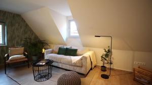 Posezení v ubytování homie stay Julius Apartments - Iphofen