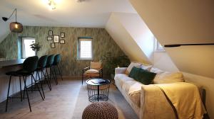 Posezení v ubytování homie stay Julius Apartments - Iphofen