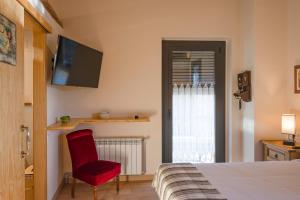 Postel nebo postele na pokoji v ubytování Cal Marti de Gironella