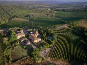 an aerial view of an estate in the vineyards at Castello di Bossi in Castelnuovo Berardenga