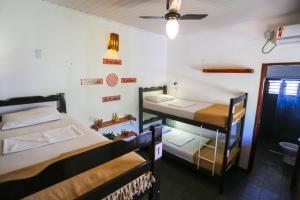 Postel nebo postele na pokoji v ubytování Mandala Hostel Jeri
