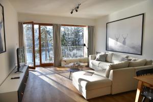 Televízia a/alebo spoločenská miestnosť v ubytovaní Element Lakeside Apartments