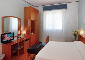 Katil atau katil-katil dalam bilik di Hotel Autostrada