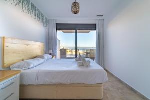 Posteľ alebo postele v izbe v ubytovaní Myflats Deluxe Balcon de Arenales + 37 fotografií