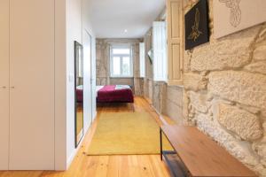 Ένα ή περισσότερα κρεβάτια σε δωμάτιο στο HM - Porto Blue Pool Apartment +18 φωτογραφίες