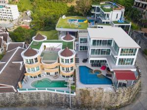an aerial view of a house with a swimming pool at Castle Patong amazing private pool villa in great Location of Patong in Patong Beach