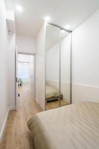 Modern Scandinavian Feeling-PRIME RENTALS tesisinde bir odada yatak veya yataklar