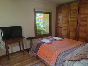 Cama ou camas em um quarto em Casa Campestre con piscina compartida