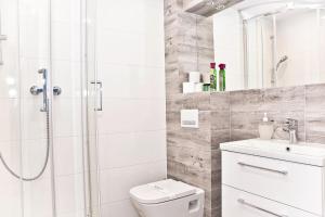 Kúpeľňa v ubytovaní Apartament w Chmurach - Apartamentuj + 21 fotografií