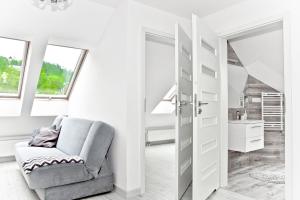 Posedenie v ubytovaní Apartament w Chmurach - Apartamentuj