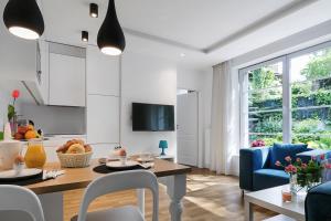 TV a/nebo společenská místnost v ubytování Costa Apartments