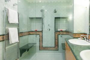 a bathroom with a shower and a sink and a showerspective at La Dolce Vista - B&B di Charme in Manfredonia +95 photos