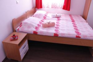 Postel nebo postele na pokoji v ubytování Villa Sparadise