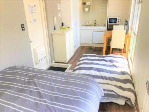 Krevet ili kreveti u jedinici u objektu Hotel PEACE PARK Tokaichi - Vacation STAY 95327v