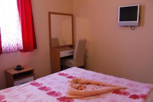 Postel nebo postele na pokoji v ubytování Villa Sparadise