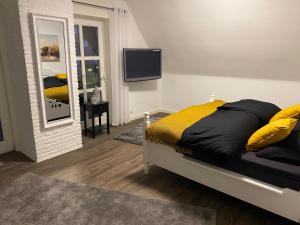 Кровать или кровати в номере Apartments-Bocholt