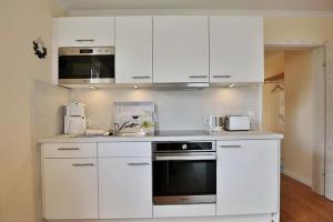Kuchyň nebo kuchyňský kout v ubytování Gorch-Fock-Park Haus 02 Gorch-Fock-Park 2 Appartement 15