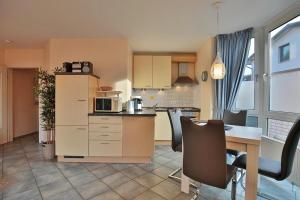 Kuchyň nebo kuchyňský kout v ubytování Gorch-Fock-Straße 16 Gorch-Fock-Str 16 Appartement 1