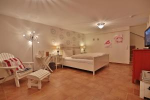 Ένα ή περισσότερα κρεβάτια σε δωμάτιο στο Sunshine-Residenz Sunshine Residenz Appartement 1 Godewind