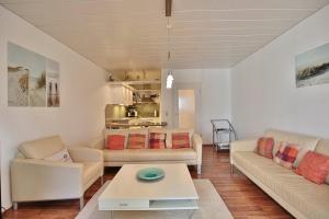 Posezení v ubytování Ferienhaus Strandgarten Ferienhaus Strandgarten