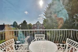 Balkón nebo terasa v ubytování Gorch-Fock-Straße 16 Gorch-Fock-Str 16 Appartement 8