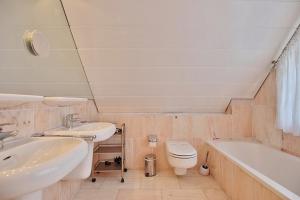 Koupelna v ubytování Ferienhaus Strandgarten Ferienhaus Strandgarten