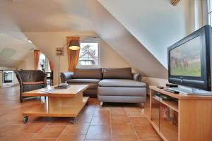 TV a/nebo společenská místnost v ubytování Sunshine-Residenz Sunshine Residenz Appartement 6