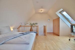 Postel nebo postele na pokoji v ubytování Sunshine-Residenz Sunshine Residenz Appartement 6