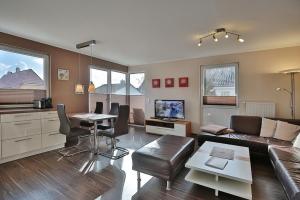 TV a/nebo společenská místnost v ubytování Residenz Herrenbruchstr Residenz Herrenbruchstraße 5 Appartement 4